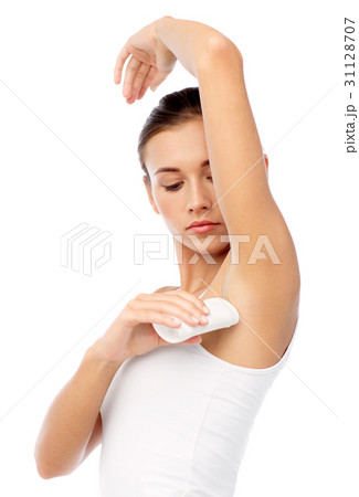 woman with antiperspirant deodorant over white 31128707