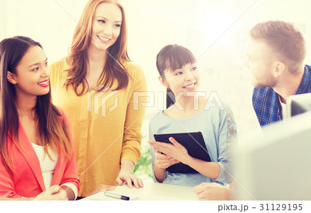 happy creative team or students working at office happy creative team or students working at office 31129195