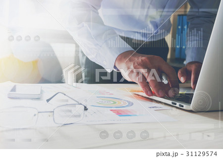 businessman hand working with laptop on wooden. businessman hand working with laptop on wooden. 31129574