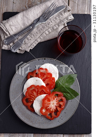 Caprese salad and red wine Caprese salad and red wine 31130197