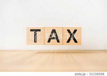 floating wooden cube with word on wood floor 31130308