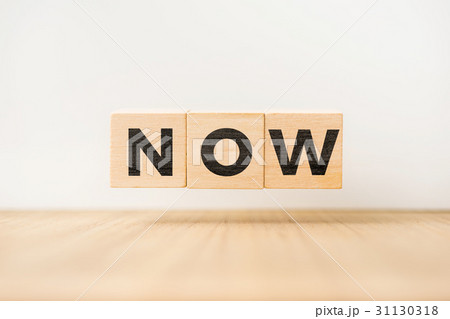 floating wooden cube with word on wood floor 31130318