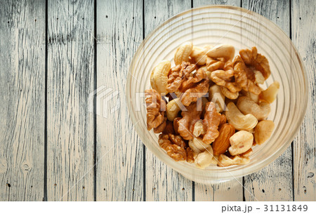 Glass bowl of mixed nuts Glass bowl of mixed nuts 31131849