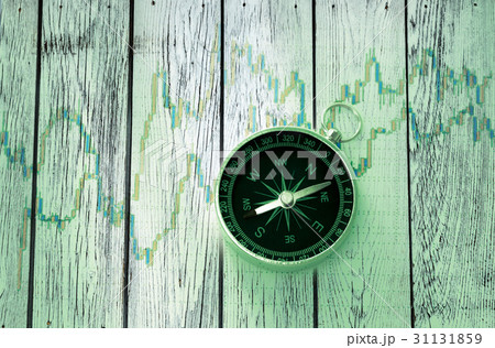 Compass on stock market data chart 31131859
