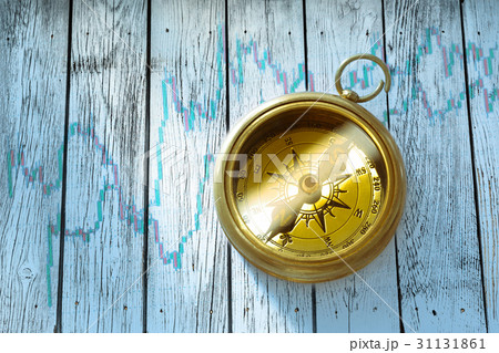 Compass on stock market data chart 31131861