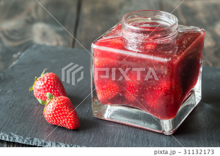 Glass jar of strawberry jam Glass jar of strawberry jam 31132173