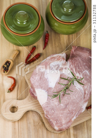 Pork and pots on the table. Cooking. Pork and pots on the table. Cooking. 31132788