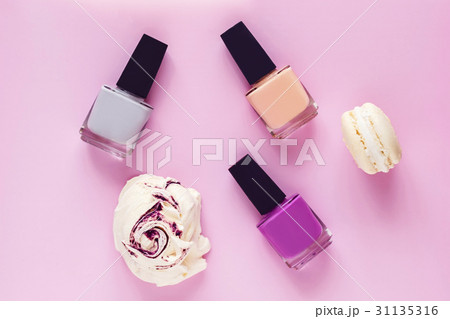 Colorful nail polishes on color background Colorful nail polishes on color background 31135316