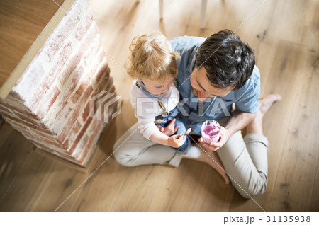 Young father with his son at home. Young father with his son at home. 31135938