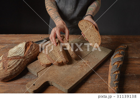 Sliced bread on a board Sliced bread on a board 31139138