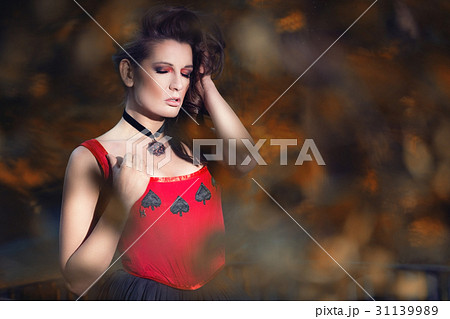 Mysterious woman in Victorian dress  31139989