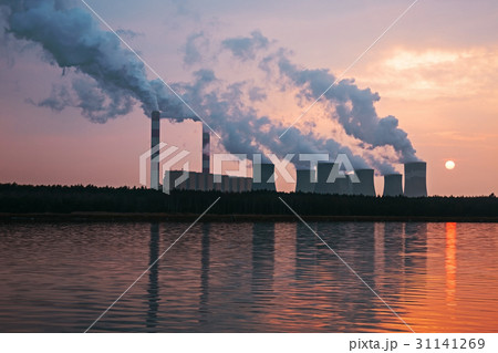 The smoke from the chimneys of a power plant 31141269