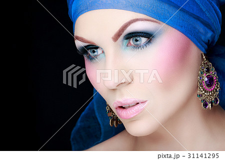 Beautiful woman in a lovely colorful makeup Beautiful woman in a lovely colorful makeup 31141295