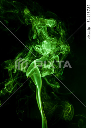 Green smoke movement on black background. Green smoke movement on black background. 31143782