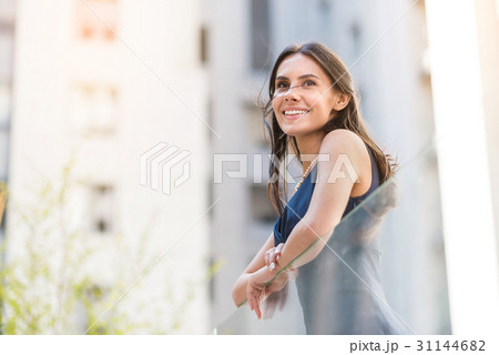 Pretty woman demonstrating happiness outdoor 31144682