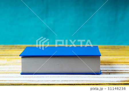 Book on wooden table. Back to school. Copy space 31146236