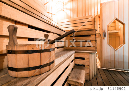 Empty wooden sauna room with ladle, bucket ready 31146902