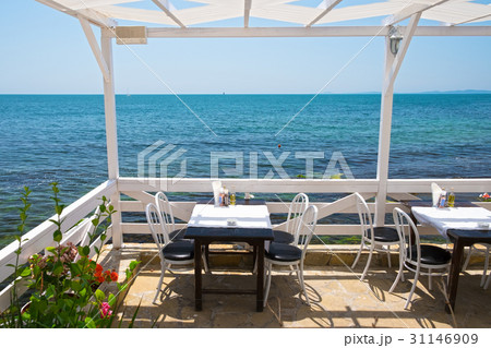 Tables and chairs in cafe on sea coast in Bulgaria 31146909