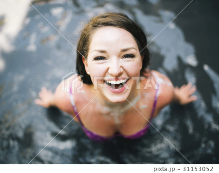 Woman bathing in mud 31153052