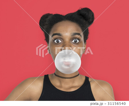 African Woman Blowing Bubble Gum Playful Portrait 31156540