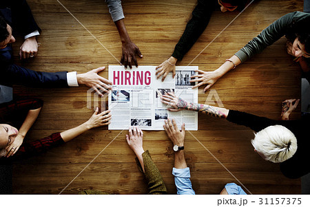 Hands Reach Out for Career Hiring Newspaper 31157375