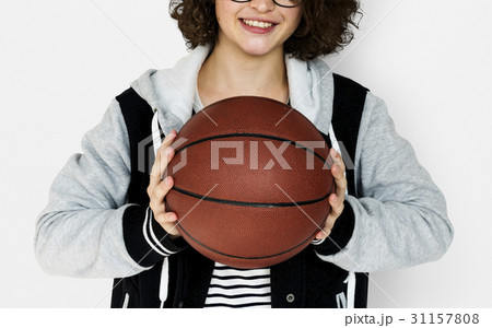 Young Adult Woman with Basketball Studio Portrait 31157808