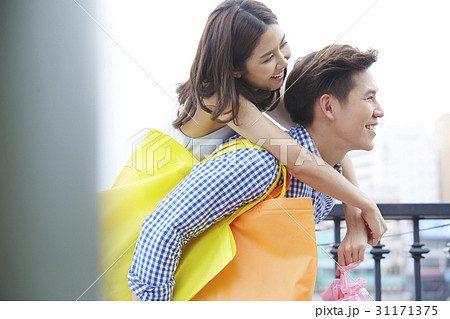 Asian couple enjoy dating with happiness Asian couple enjoy dating with happiness 31171375