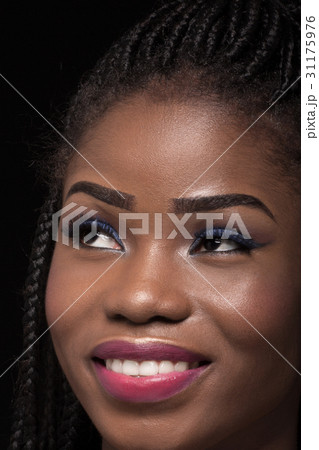 Close up portrait of dark skinned model on black Close up portrait of dark skinned model on black 31175976