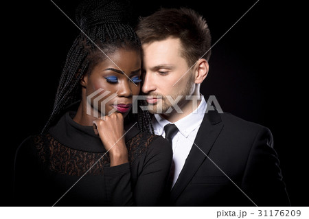 Close up portrait of romantic multi-ethnic couple 31176209