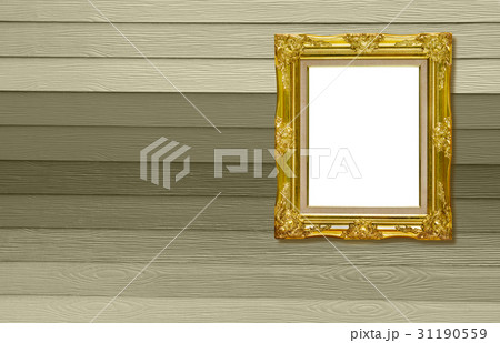 antique golden picture frame on wooden board 31190559