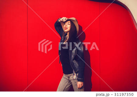 Smiling trendy model posing Smiling trendy model posing 31197350