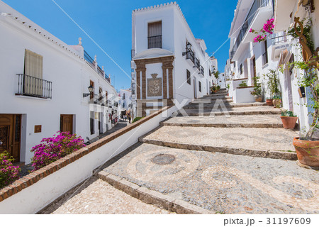 Charming narrow historic streets of Frigiliana. Charming narrow historic streets of Frigiliana. 31197609