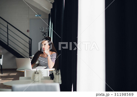 Looking for inspiration. Young beautiful pensive 31198569