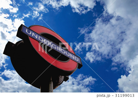 London underground sign over blue sky London underground sign over blue sky 31199013