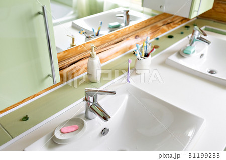 The bathroom in a rustic log cabin, in the 31199233