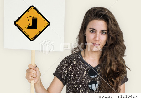 Studio Shoot Holding Banner with Safety Boots Attention Sign 31210427