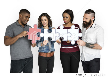 People are holding puzzle together People are holding puzzle together 31212558