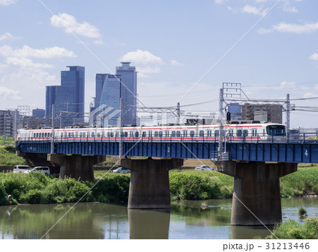 名古屋市西区・枇杷島・都市風景　名鉄名古屋本線　庄内川橋梁と名古屋駅中心部  31213446