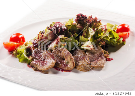 Meat plate with delicious pieces of sliced ham Meat plate with delicious pieces of sliced ham 31227942