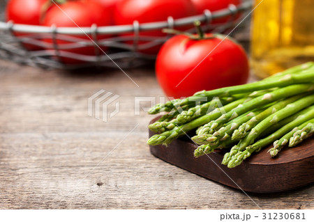 fresh asparagus, tomatoes, olive oil fresh asparagus, tomatoes, olive oil 31230681