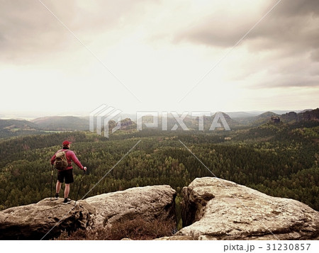 Tourist in black sportswear,backpack on view point 31230857