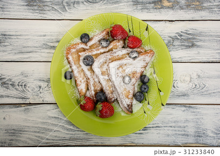 French toasts with berries French toasts with berries 31233840
