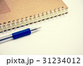 brown notebook and pen on white background vintage 31234012
