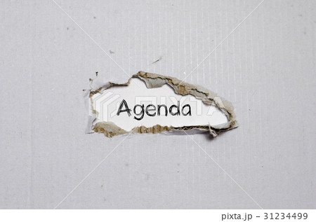 The word agenda appearing behind torn paper 31234499