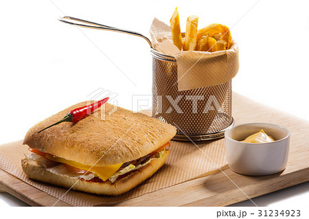 Cheeseburger and french fries Cheeseburger and french fries 31234923
