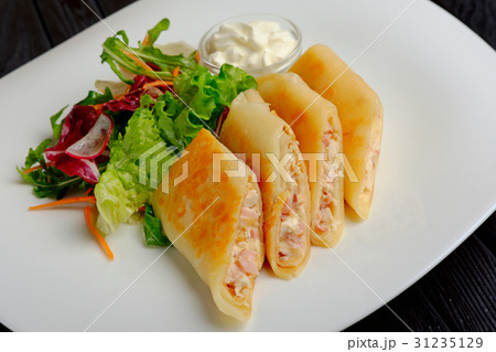 Pancakes with ham and salad Pancakes with ham and salad 31235129