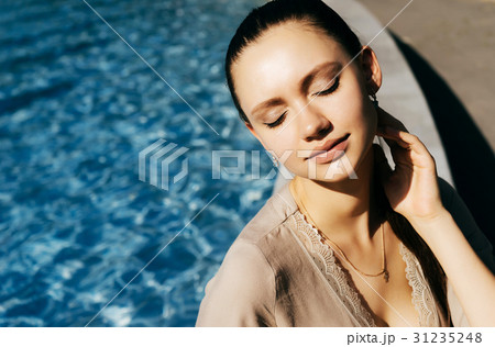 Clear toned skin woman enjoy summer vacation near 31235248
