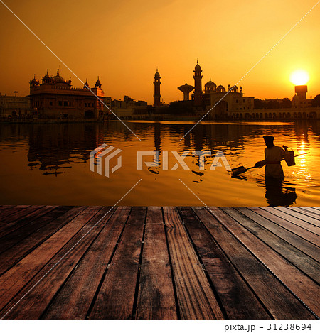 Cleaning the pool of the Golden Temple, India 31238694