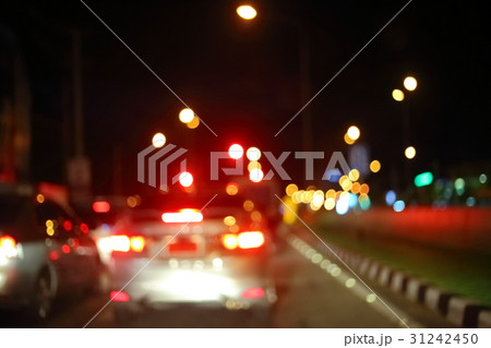 traffic light of driving car on city night street 31242450