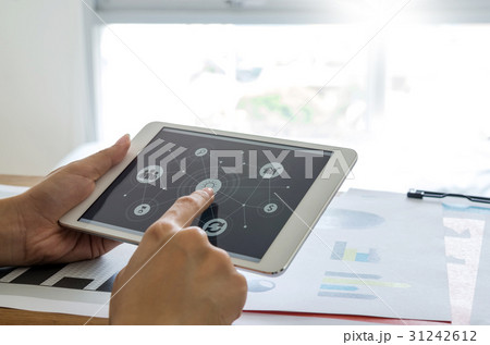 Woman hands using tablet with business connect. Woman hands using tablet with business connect. 31242612